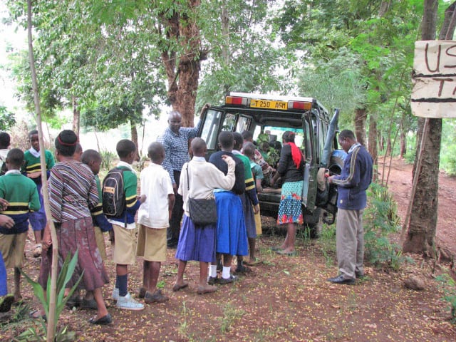 Kimashuka Primary School students help plant seedlings in Hai Destrict, west of Moshi
