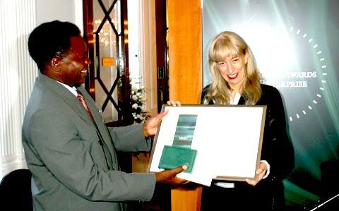 Baroness Susan Greenfield, Director of the Royal Institution in London, presents Sebastian with Rolex Award Certificate