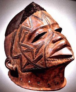 Makonde Lipiko Mask, showing facial scarification and stylized features