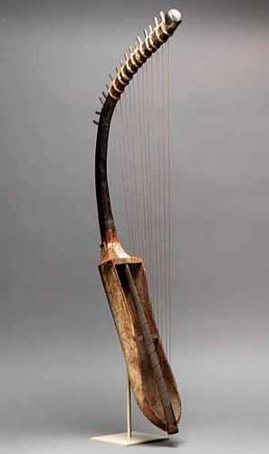 Neck of Egyptian Ebony Harp is made of African blackwood.